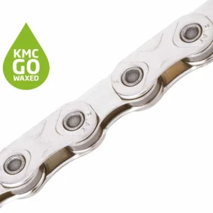 Close-up of a silver waxed bicycle chain with a green KMC GO WAXED logo on a white background.